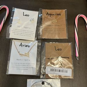 New  necklace and earrings  what’s your sign great Christmas gift  very nice